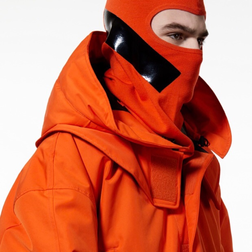 RAF SIMMONS x TEMPLA OVERSIZED JACKET IN ORANGE
